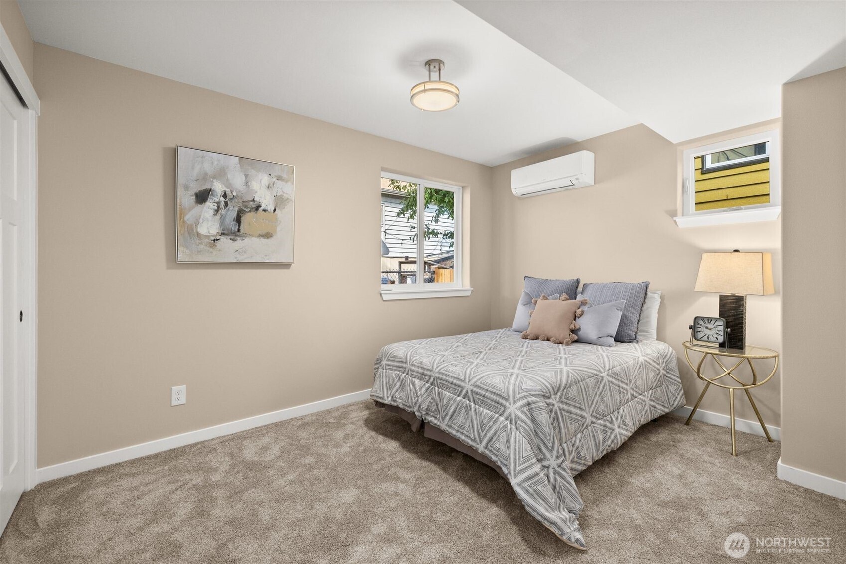 6419 Ellis Avenue South Seattle, WA 98108 - Photo 18 of 28 a bedroom with a bed and a window