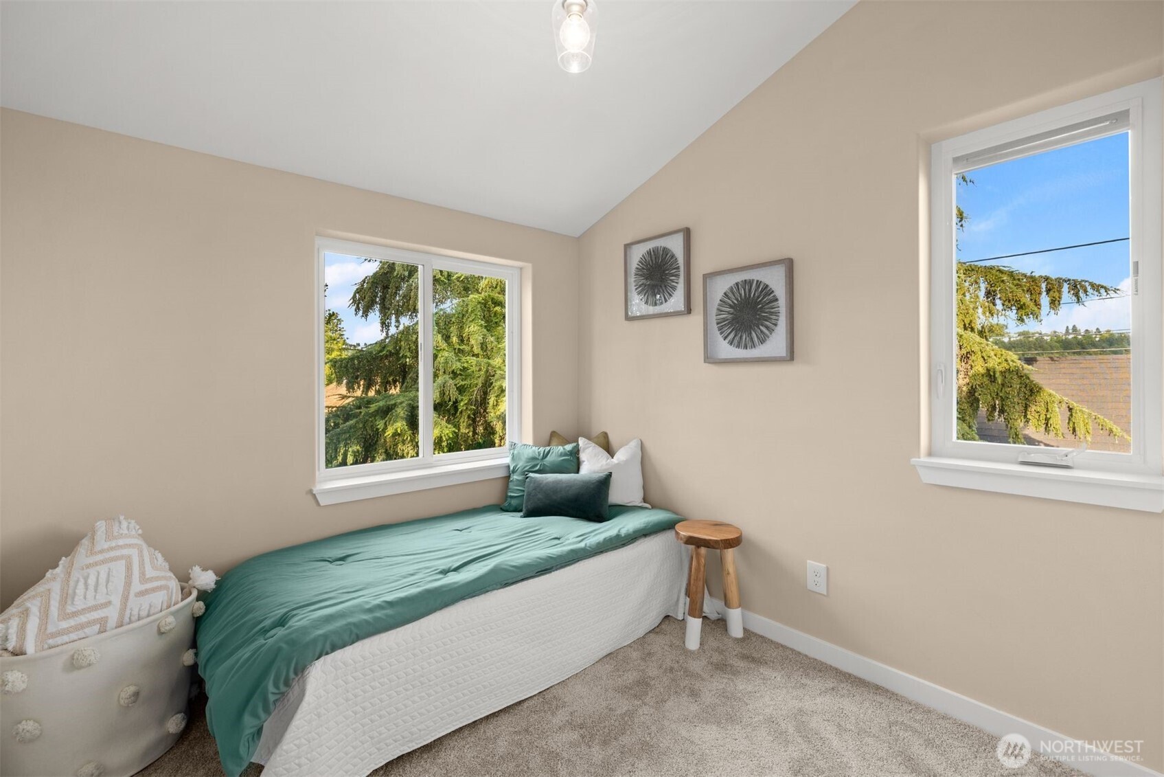6419 Ellis Avenue South Seattle, WA 98108 - Photo 20 of 28 a bedroom with a bed and window