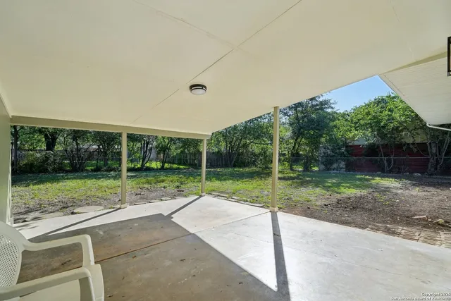 a view of a yard with porch