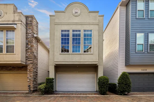 a swimming pool with yard and outdoor seating