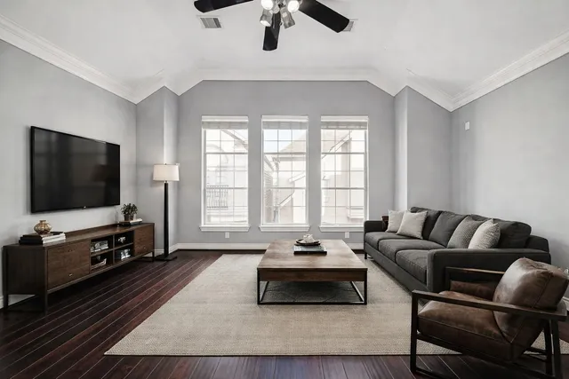 a swimming pool with yard and outdoor seating