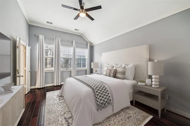 a kitchen with granite countertop a refrigerator and a stove top oven
