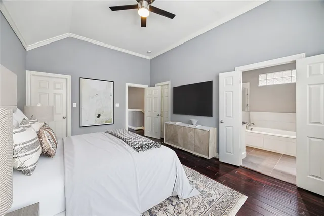 a kitchen with stainless steel appliances granite countertop a sink window and wooden floor