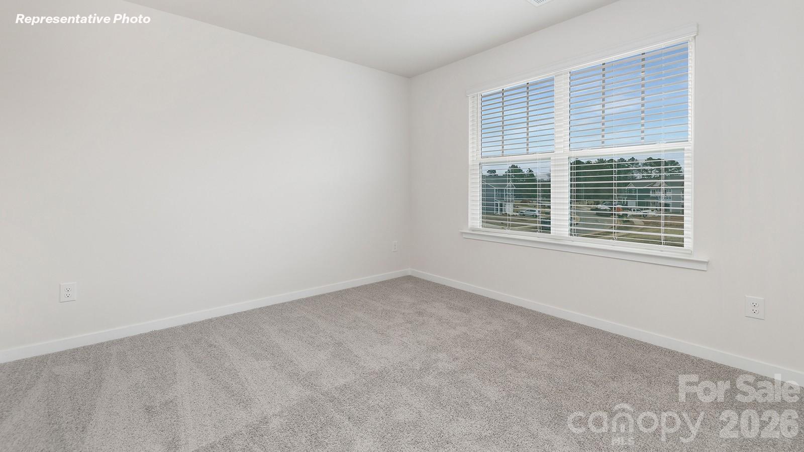 4560 Harris Elliot Road Lincolnton, NC 28092 - Photo 22 of 34 an empty room with a window