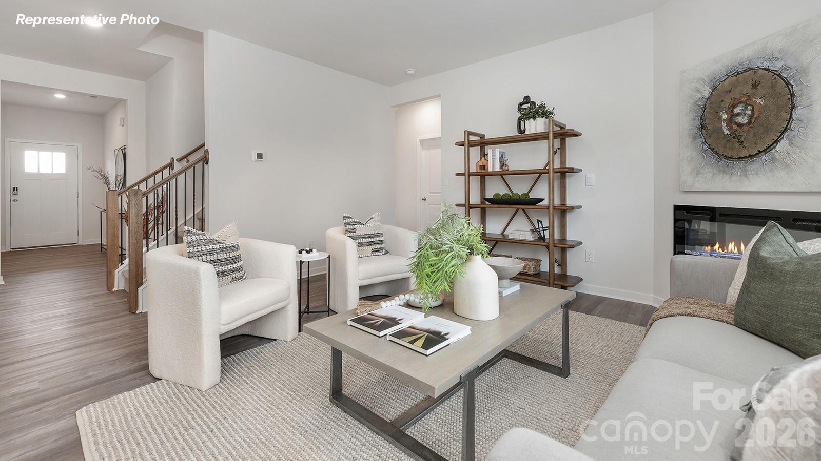 4560 Harris Elliot Road Lincolnton, NC 28092 - Photo 7 of 34 a living room with furniture and wooden floor