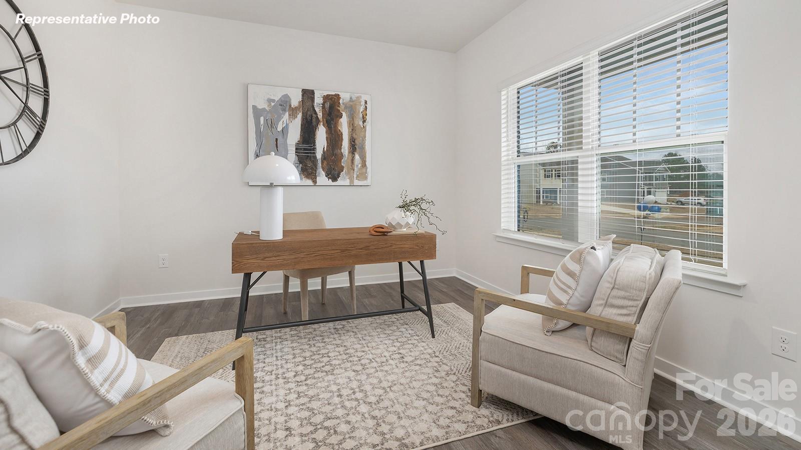 4560 Harris Elliot Road Lincolnton, NC 28092 - Photo 9 of 34 a living room with furniture a table and a window