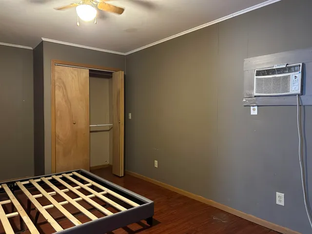 a view of a yard with snow on the road