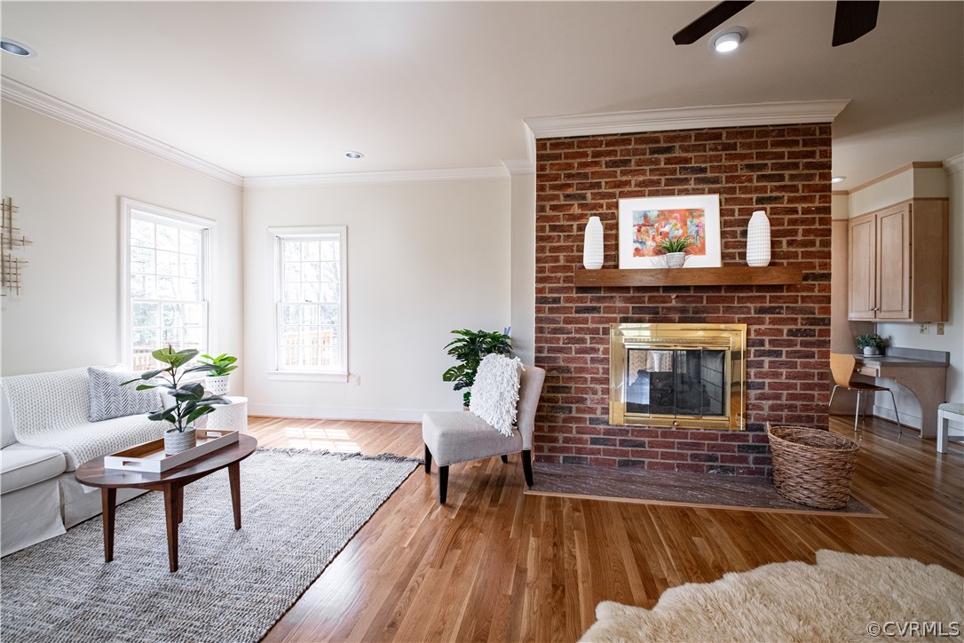 10497 Georgetown Road Mechanicsville, VA 23116 - Photo 11 of 50 a living room with furniture and a fireplace