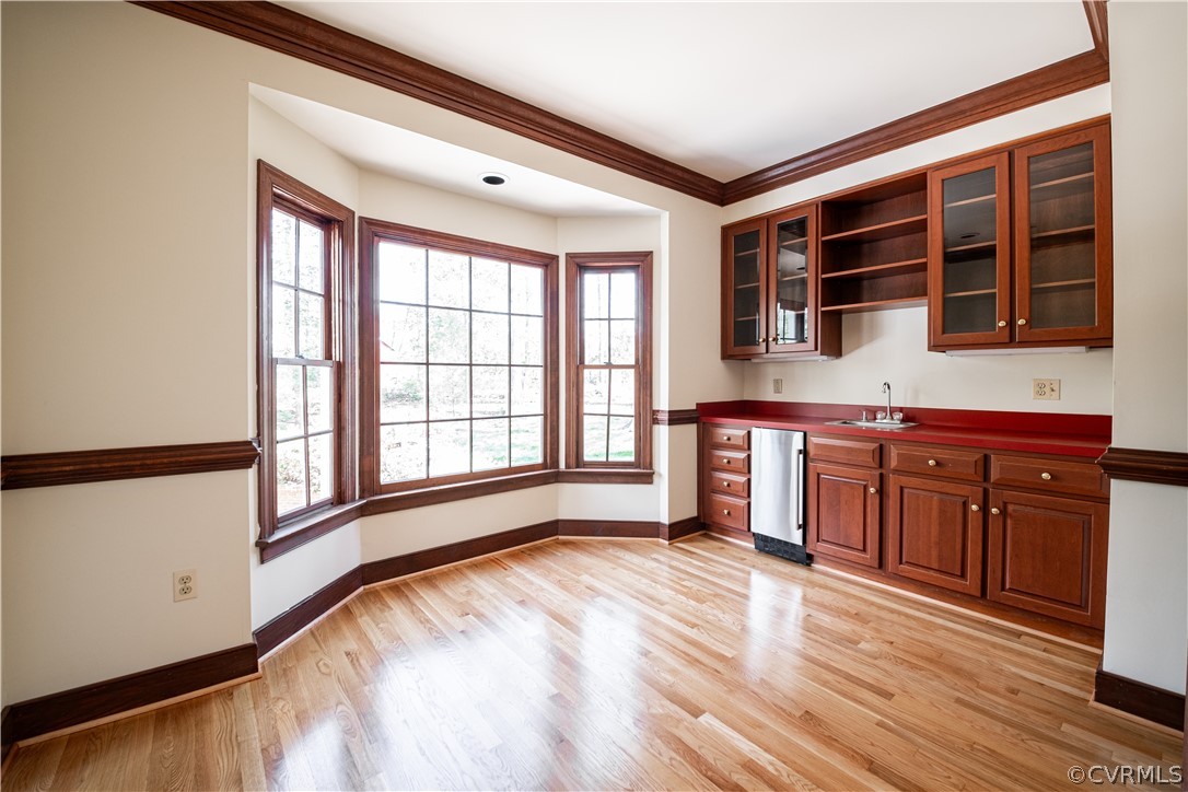 10497 Georgetown Road Mechanicsville, VA 23116 - Photo 12 of 50 a spacious bedroom with a large bed and a large window