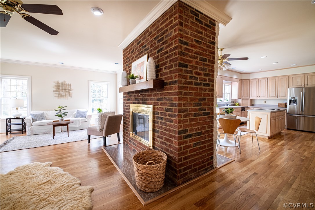10497 Georgetown Road Mechanicsville, VA 23116 - Photo 13 of 50 a living room with furniture and a fireplace