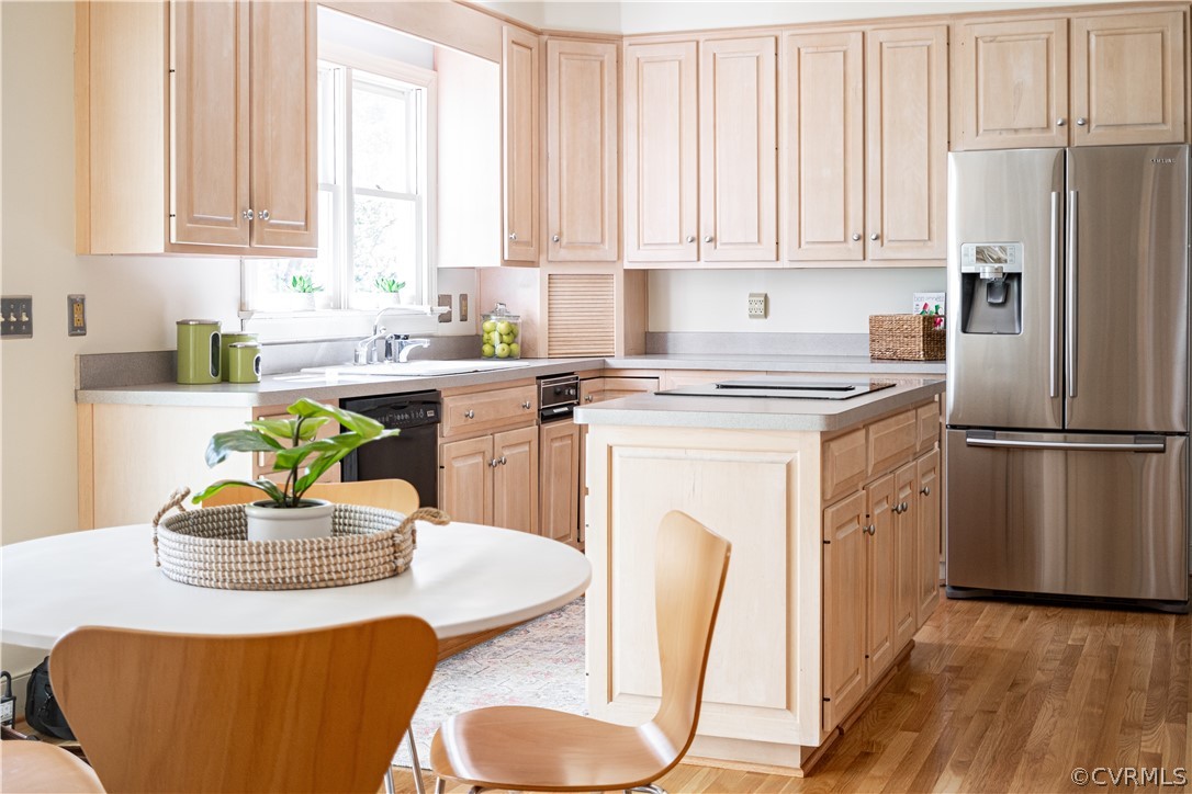 10497 Georgetown Road Mechanicsville, VA 23116 - Photo 18 of 50 a kitchen with appliances cabinets and chair