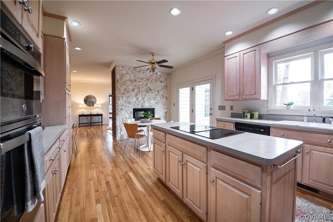 10497 Georgetown Road Mechanicsville, VA 23116 - Photo 24 of 50 a kitchen with stainless steel appliances granite countertop a sink stove and refrigerator