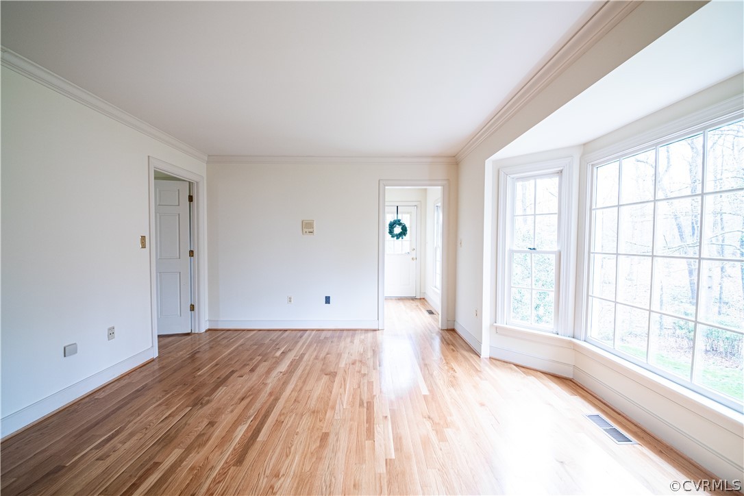 10497 Georgetown Road Mechanicsville, VA 23116 - Photo 26 of 50 a view of a room with wooden floor and a window