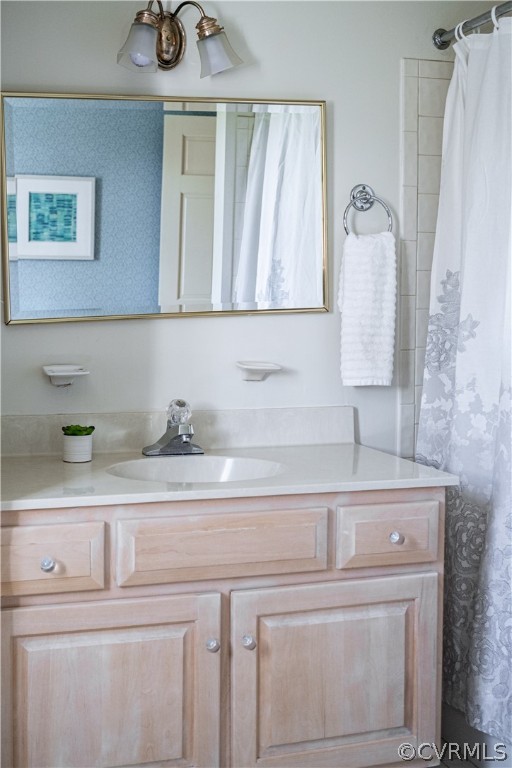 10497 Georgetown Road Mechanicsville, VA 23116 - Photo 37 of 50 a bathroom with a sink a mirror and vanity