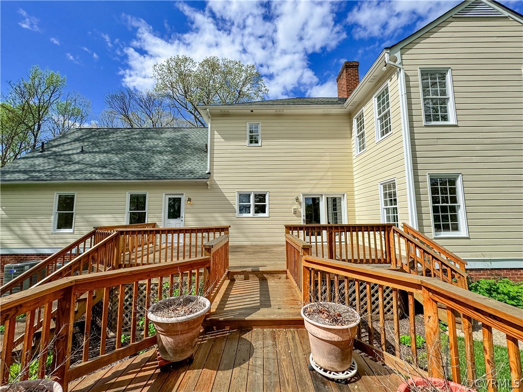 10497 Georgetown Road Mechanicsville, VA 23116 - Photo 43 of 50 a front view of a house with a garden