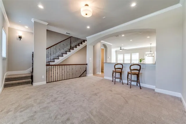 a view of a hallway with livingroom