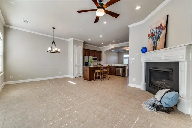 a view of a livingroom with furniture and a fireplace