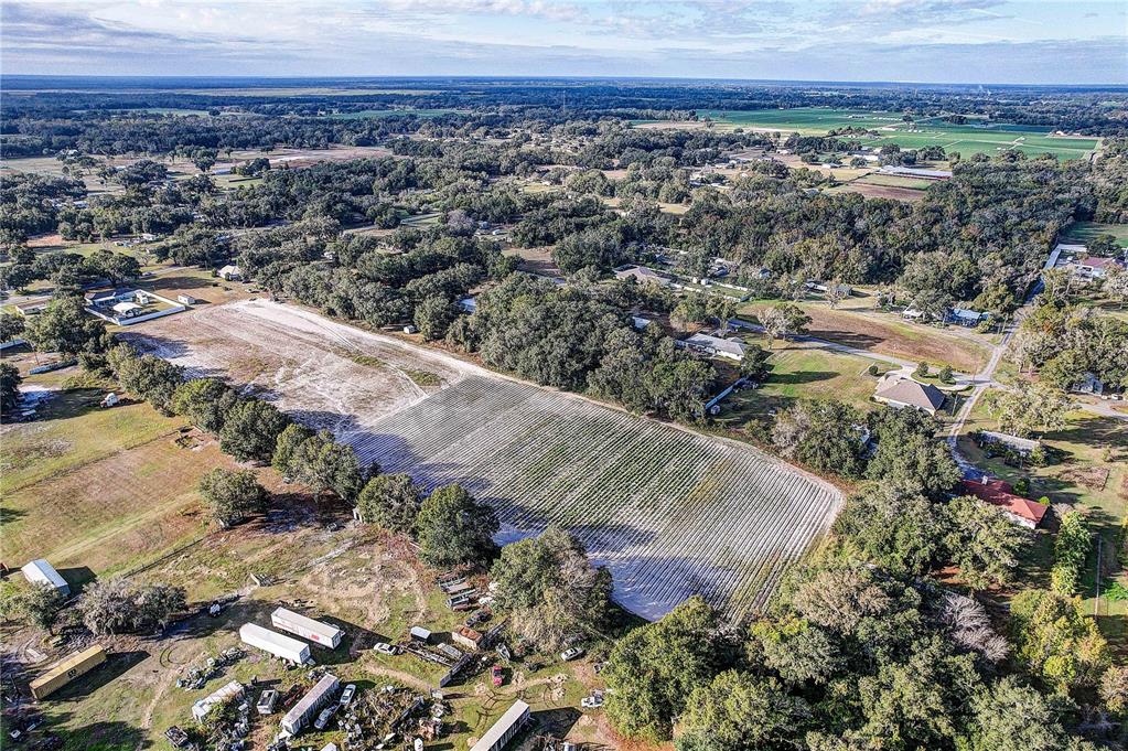 4822 Nesmith Road Plant City, FL 33567 - Photo 13 of 18 an aerial view of a house with a yard