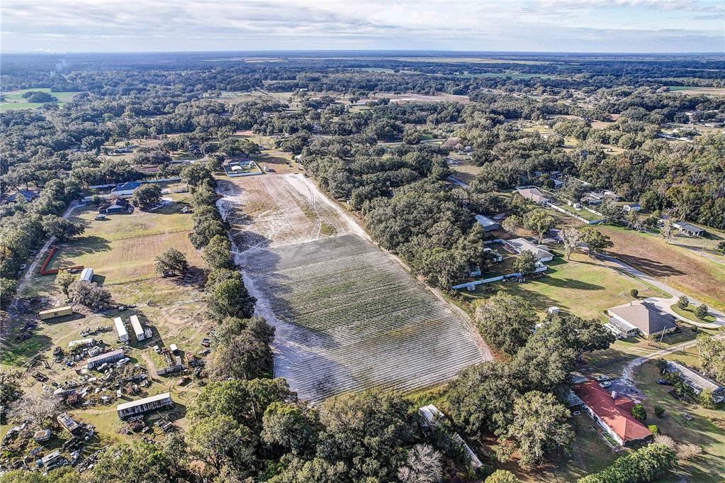 4822 Nesmith Road Plant City, FL 33567 - Photo 14 of 18 an aerial view of residential houses with outdoor space