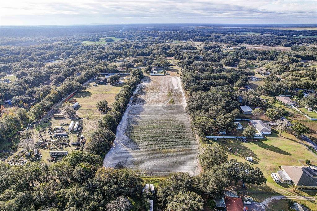 4822 Nesmith Road Plant City, FL 33567 - Photo 15 of 18 an aerial view of residential houses with outdoor space