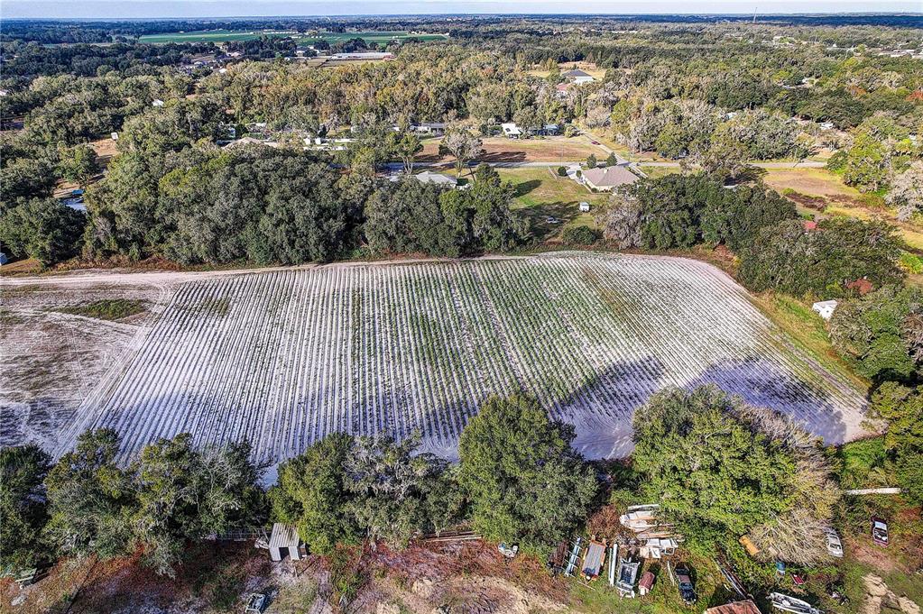 4822 Nesmith Road Plant City, FL 33567 - Photo 7 of 18 an aerial view of residential house with parking space