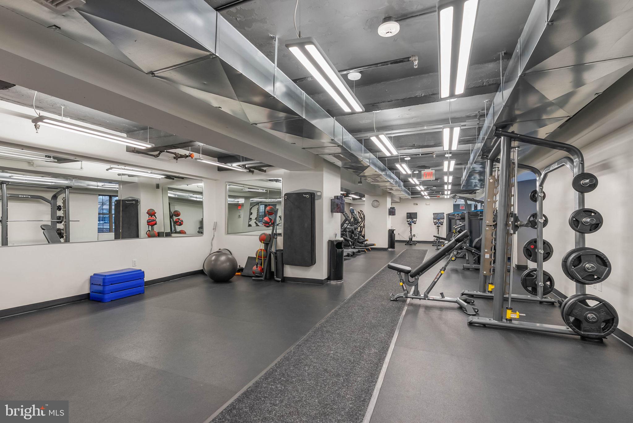 219 South 18th Street, Unit 404 Philadelphia, PA 19103 - Photo 18 of 24 a view of a room with gym equipment