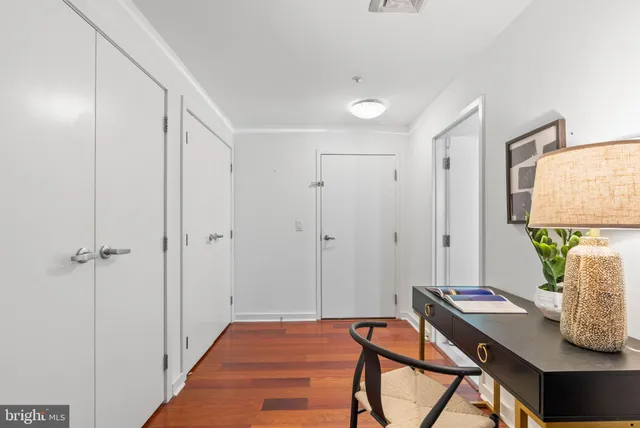 a view of a workspace with furniture