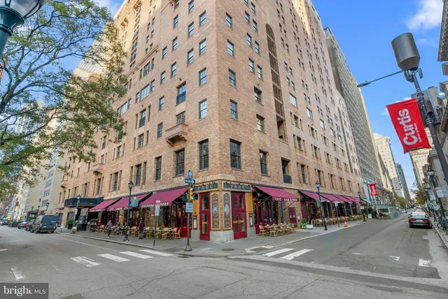 a front view of building with street