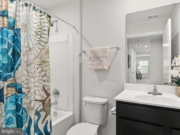 a bedroom with a bed and a cabinets