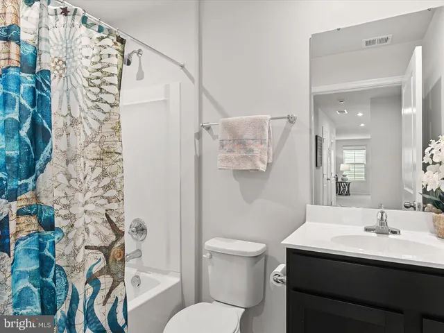 a bedroom with a bed and a cabinets