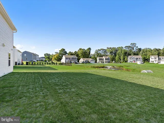 a view of a house with a park