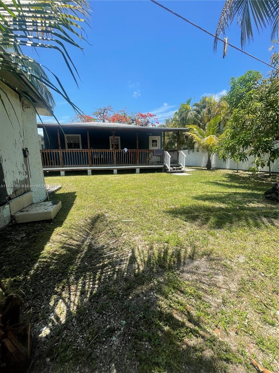 652 Northwest 28th Street Miami, FL 33127 - Photo 14 of 15 a view of a house with a big yard
