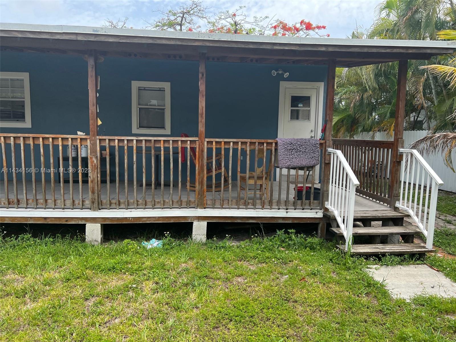 652 Northwest 28th Street Miami, FL 33127 - Photo 6 of 15 a view of a backyard with a deck