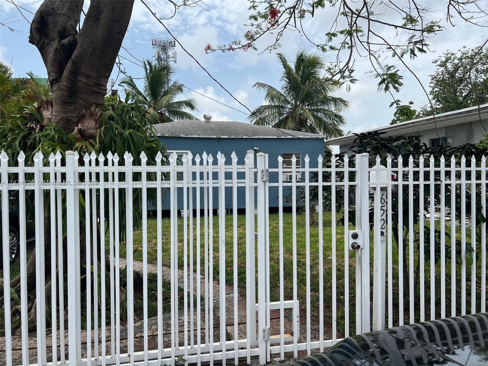 652 Northwest 28th Street Miami, FL 33127 - Photo 10 of 15 a view of a wooden fence