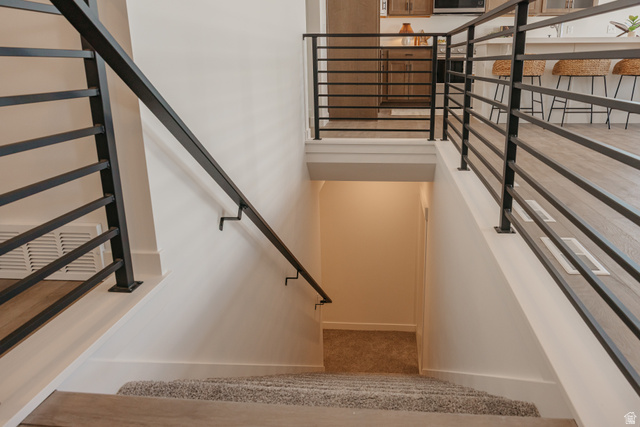 4595 North Fallow Way, Unit 511 Eagle Mountain, UT 84005 - Photo 28 of 32 Stairway with baseboards