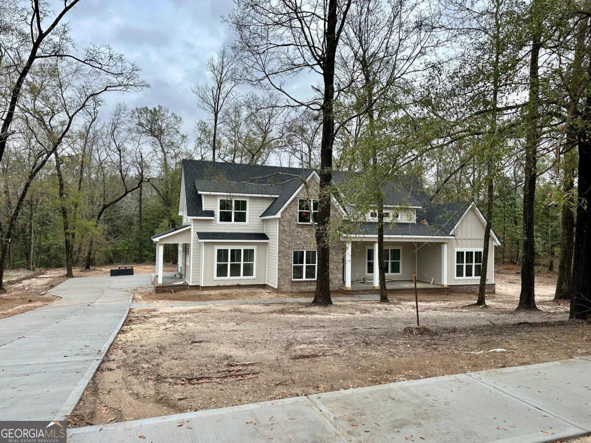 154 Cubbedge Drive Rincon, GA 31326 - Photo 1 of 1 front view of a house with a yard