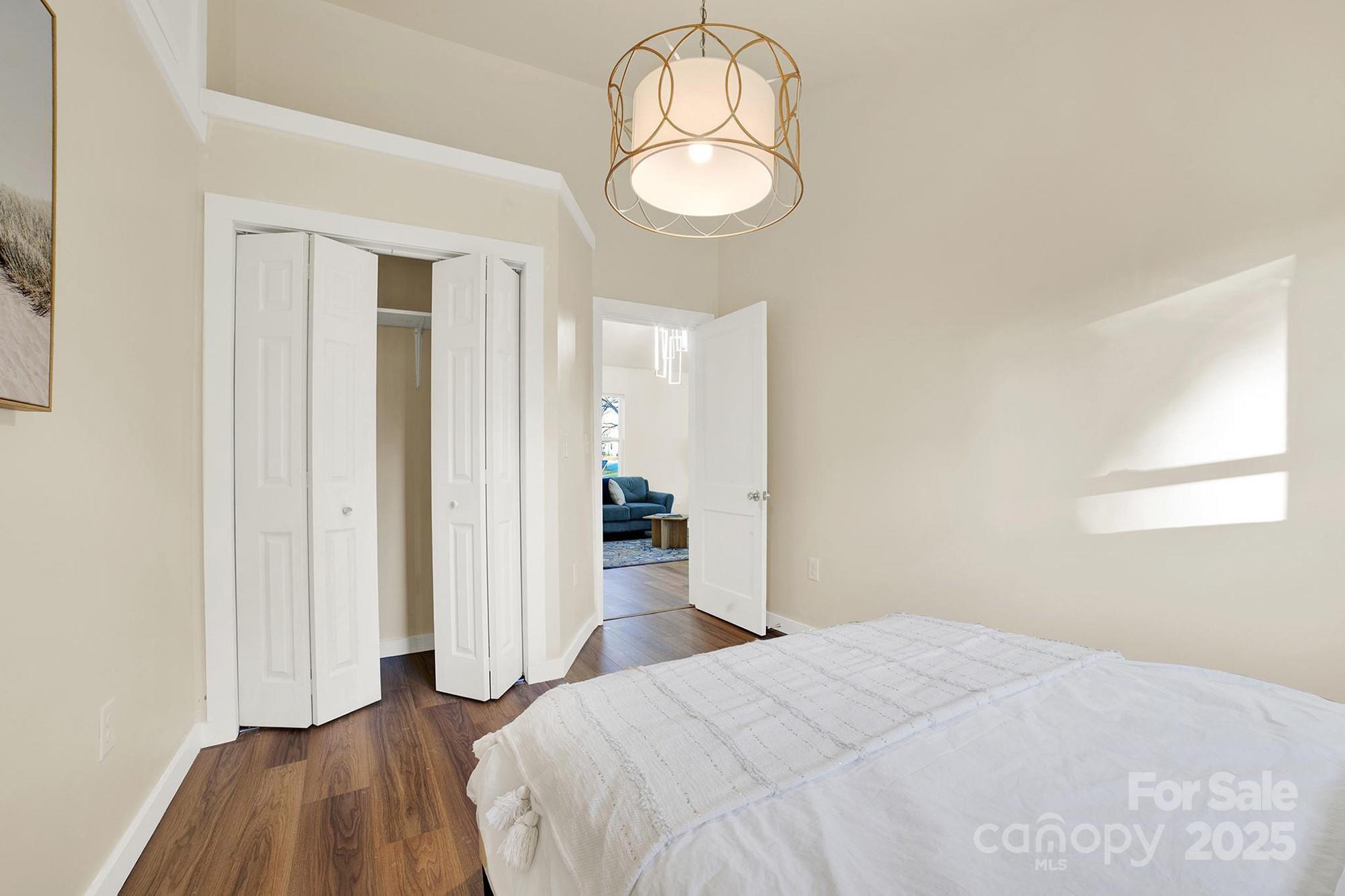410 24th Street Southwest Hickory, NC 28602 - Photo 20 of 41 a bedroom with a bed and a mirror