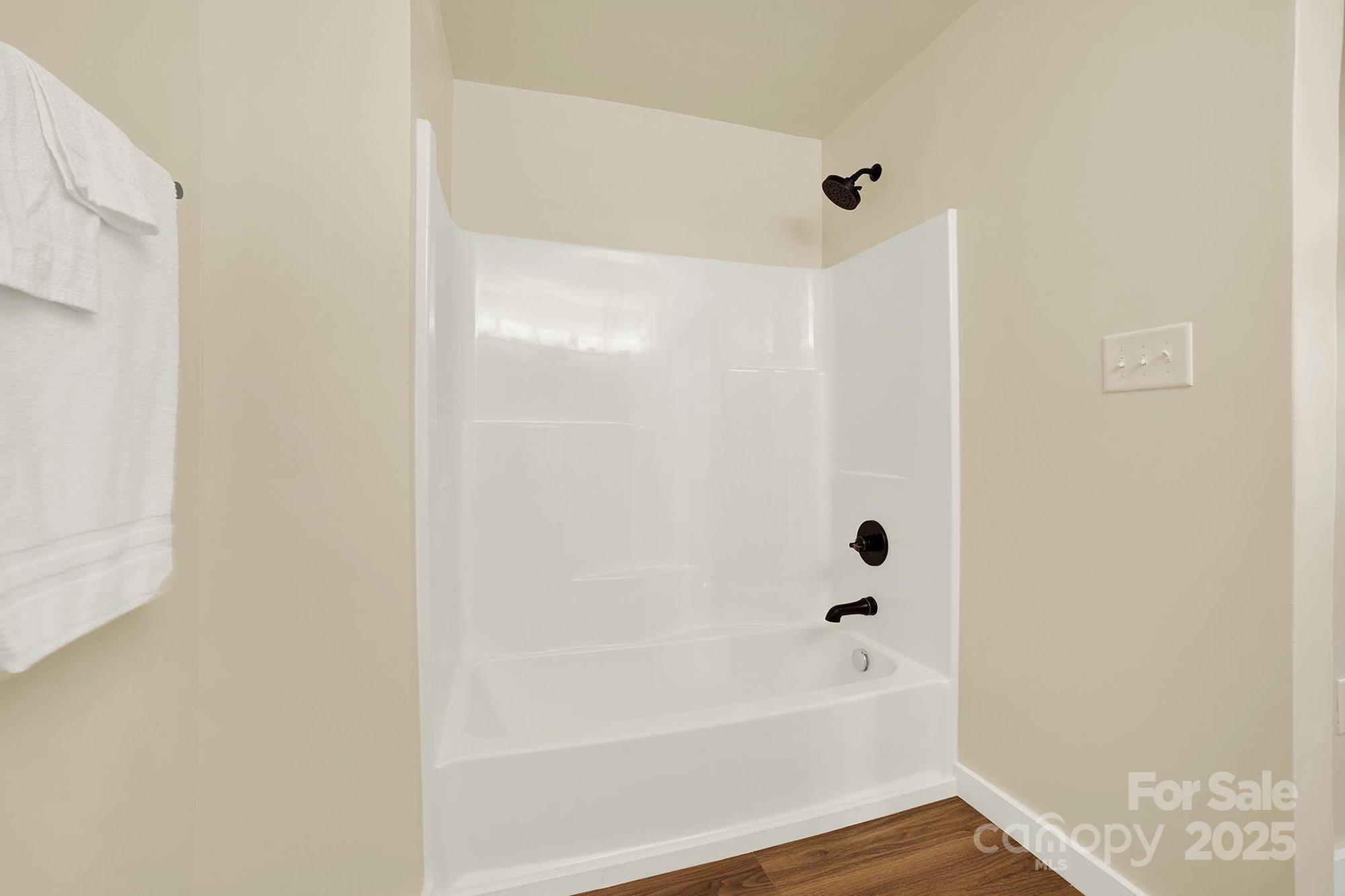 410 24th Street Southwest Hickory, NC 28602 - Photo 25 of 41 a bathroom with a bathtub