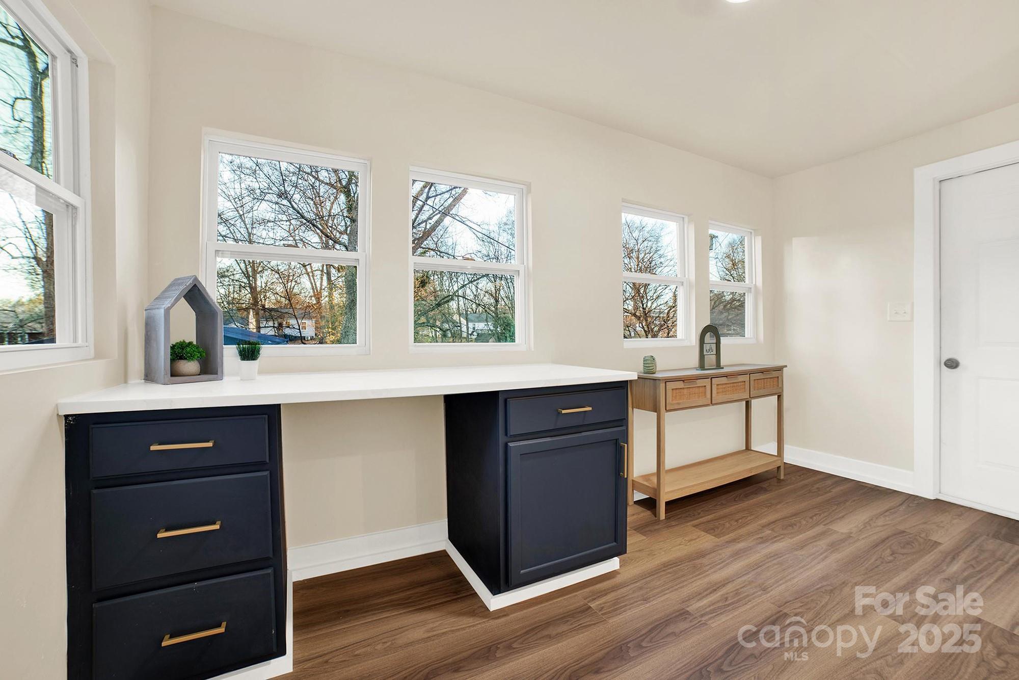 410 24th Street Southwest Hickory, NC 28602 - Photo 26 of 41 a kitchen with a wooden cabinets and sink