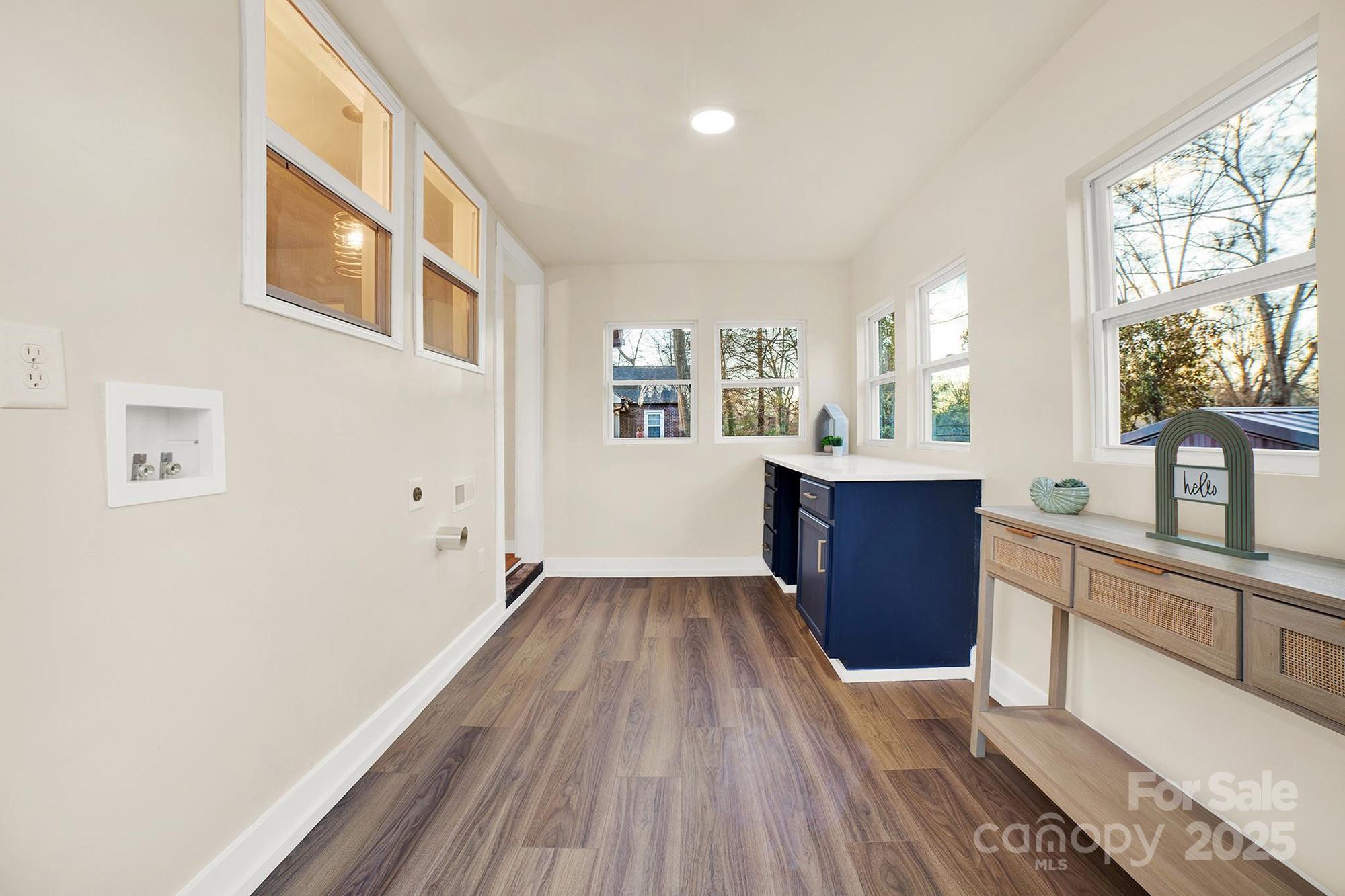 410 24th Street Southwest Hickory, NC 28602 - Photo 27 of 41 a view of a kitchen cabinets a sink and wooden floor