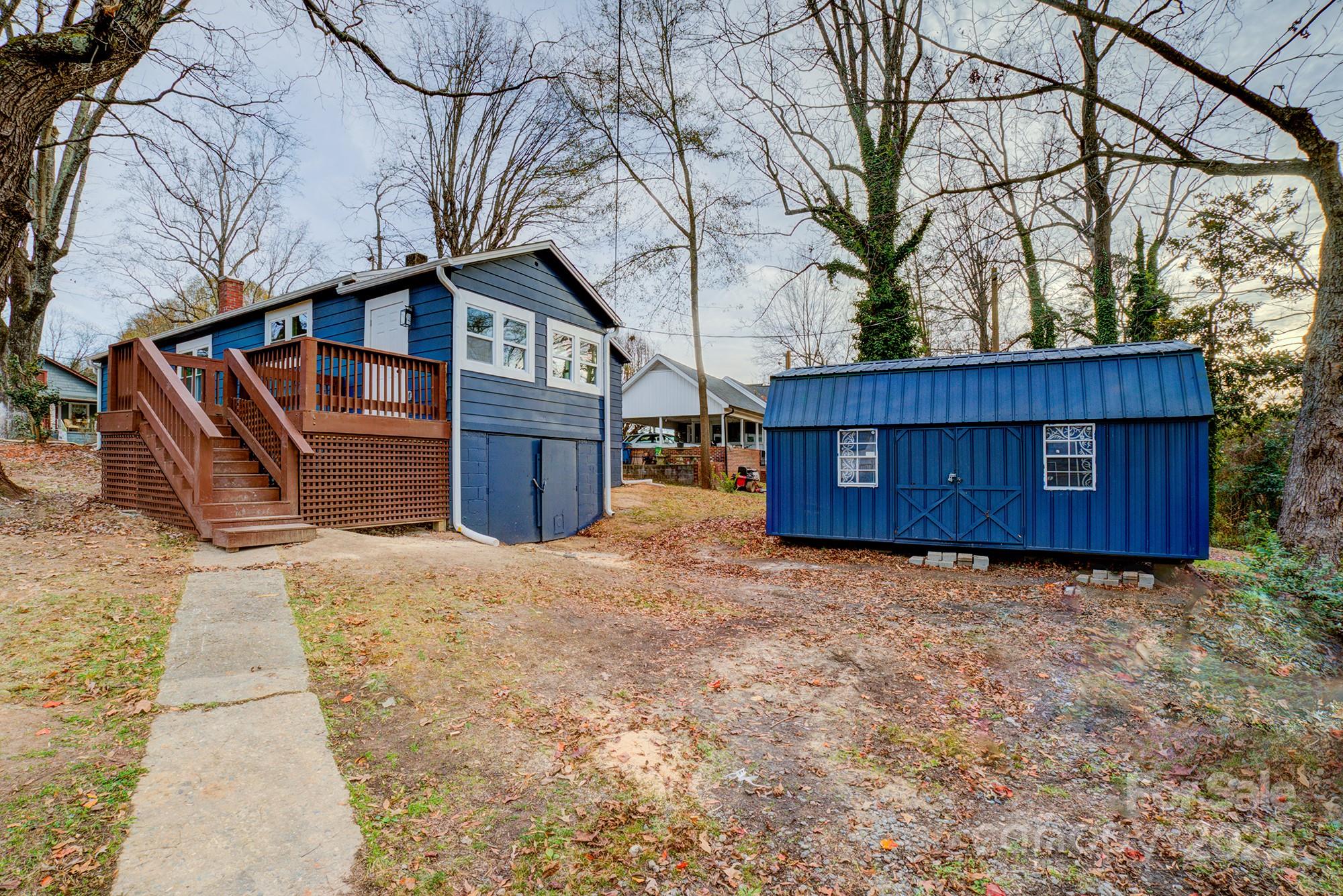 410 24th Street Southwest Hickory, NC 28602 - Photo 37 of 41 a house view with a yard covered with wooden fence