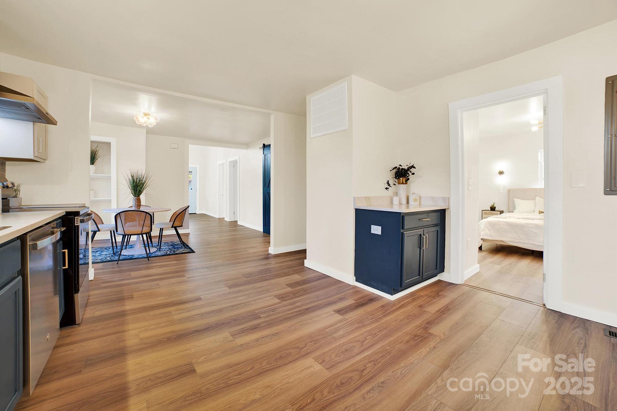 410 24th Street Southwest Hickory, NC 28602 - Photo 6 of 41 a living room with furniture and a wooden floor