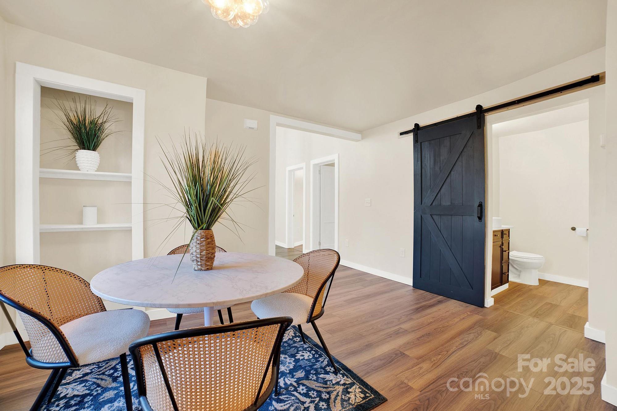 410 24th Street Southwest Hickory, NC 28602 - Photo 8 of 41 a view of a dining room with furniture and window