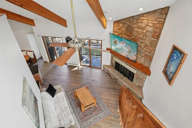 a view of an entryway with wooden floor