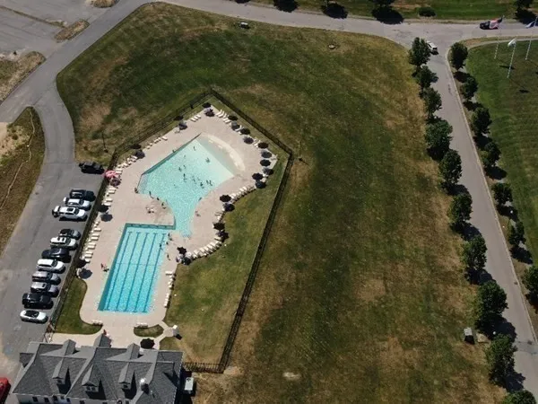a view of a lake with a big yard