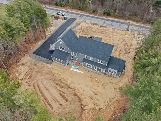 a view of a back yard of the house