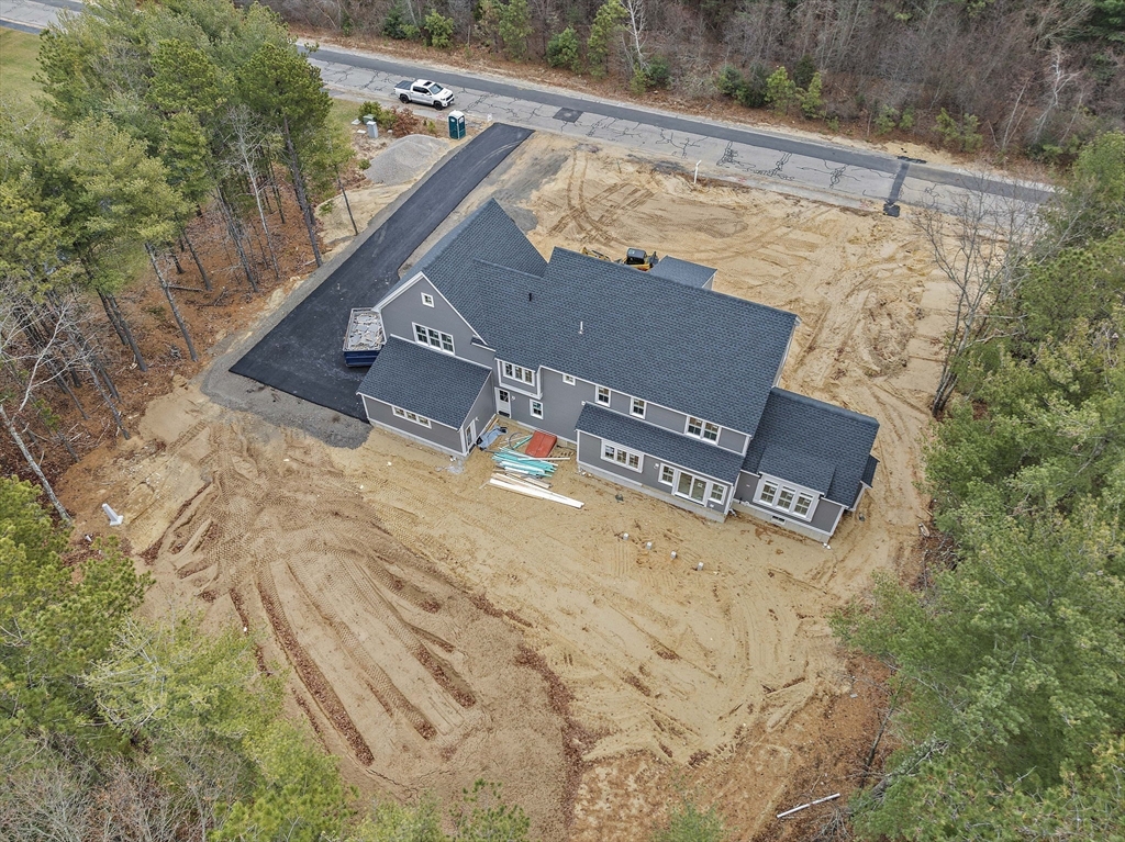 342 Country Club Way Kingston, MA 02364 - Photo 3 of 22 a view of a back yard of the house