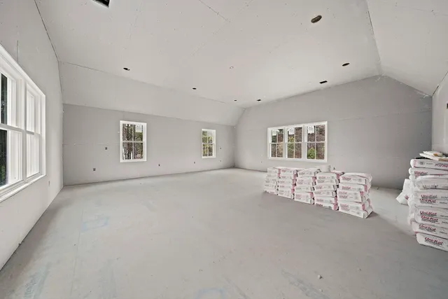 a view of livingroom with furniture and windows