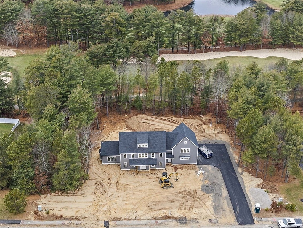 342 Country Club Way Kingston, MA 02364 - Photo 9 of 22 a view of a small house with a yard