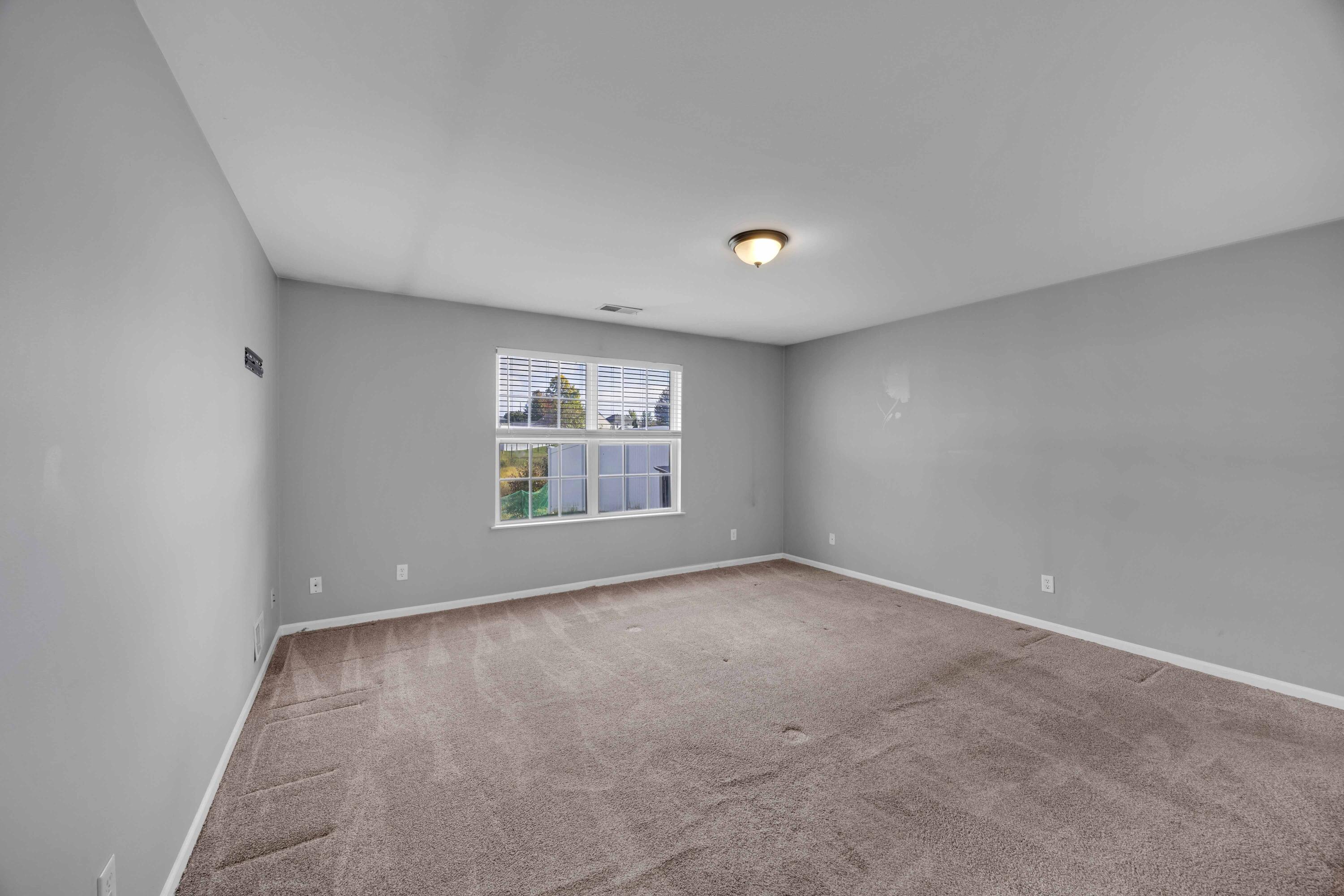 8461 Pierce Street Merrillville, IN 46410 - Photo 12 of 21 an empty room with windows